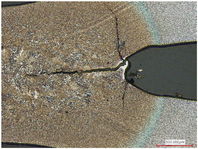 Figure 4: Cracking in Both the Weld Nugget and HAZ in Steel 8.