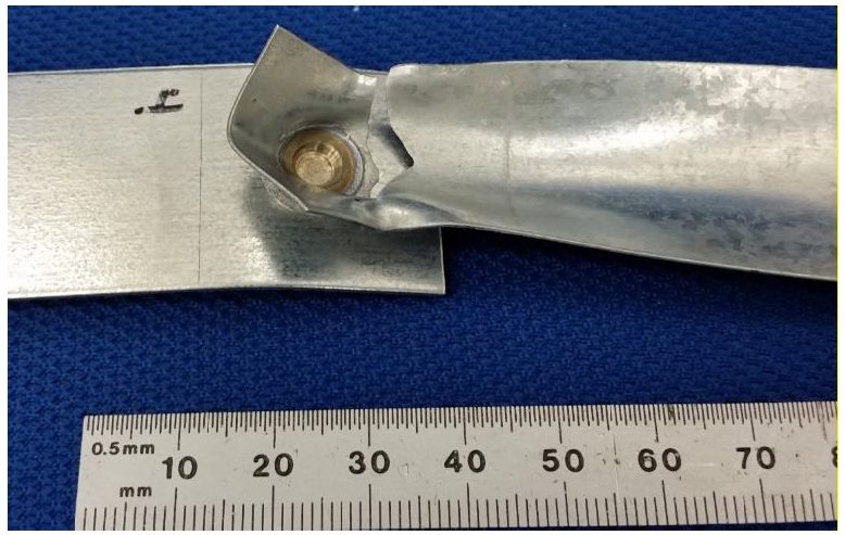 Figure 5: Friction Stir Spot Weld in 0.45-mm GMW2-HDG Fractured in Lap-Shear Tensile.