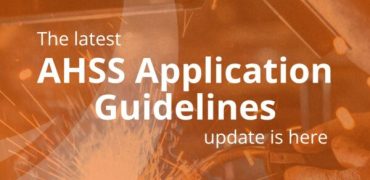 New Update Graphic - Text on Orange Background Over a Photo of Automotive Welding